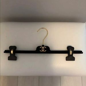 CHANEL hanger for your elegant wardrobe.